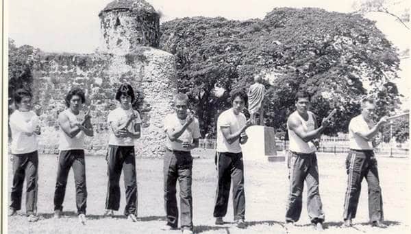 an old picture of students practicing martial arts