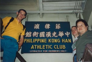 Alex Co, Mark Wiley and Simon Lailey at the entrance of Kong Han Athletic Club, circa 1995