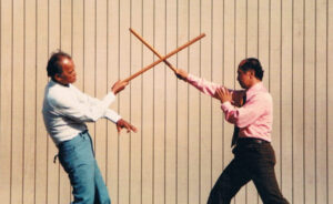 Armando Sunga teaching Ramiro Estalilla Eskrima FMA